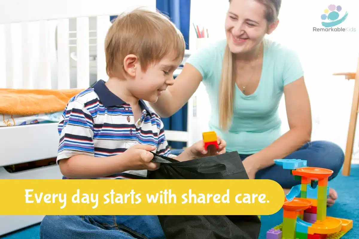 Smiling caregiver and child unpacking toys during morning care session.